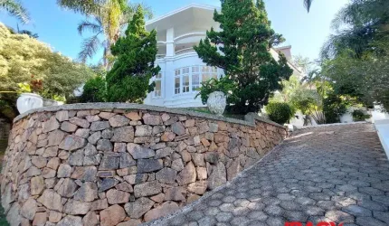 Casa em condomínio fechado com 4 quartos para alugar na Rua das Laranjeiras, 1122, Roçado, São José, 480 m2 por R$ 12.500