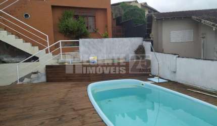 Casa à venda com 4 quartos no bairro Agronômica em Florianópolis