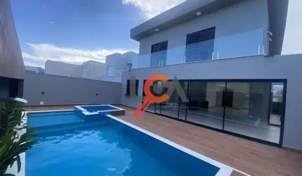 Sobrado com 4 dormitórios à venda, 304 m² por R$ 2.700.000,00 - Massaguaçu - Caraguatatuba/SP