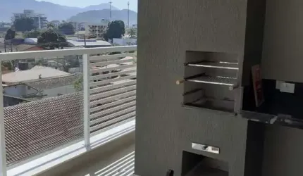 APARTAMENTO COM 2 SUÍTES NO CENTRO