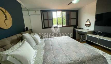 Maravilhosa casa para venda com piscina , sauna e jardim.