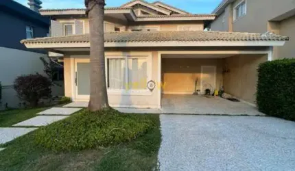 Casa em Condomínio Fechado em Alphaville com 580m², 4 suítes e 5 banheiros - Venda e Locação por R$3.950.000