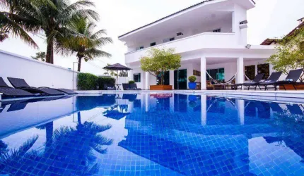 Casa com 4 dormitórios à venda, 395 m² por R$ 3.900.000,00 - Acapulco - Guarujá/SP