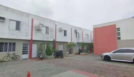 Village com 2 dormitórios à venda, 62 m² por R$ 290.000,00 - Enseada - Guarujá/SP
