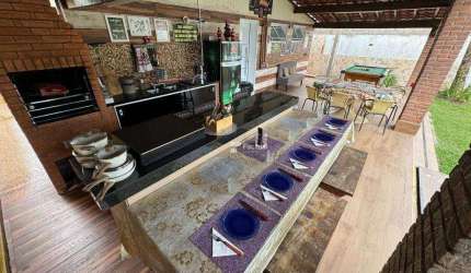 Casa com 4 dormitórios à venda, 239 m² por R$ 1.100.000,00 - Praia de Pernambuco - Guarujá/SP