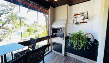 Village com 1 dormitório à venda, 50 m² - Riviera de São Lourenço - Bertioga/SP