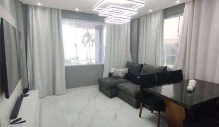 Apartamento com 3 dormitórios à venda, 122 m² por R$ 1.300.000,00 - Pitangueiras - Guarujá/SP