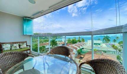Apartamento na Enseada 3 quartos com varanda gourmet e vista para o mar.