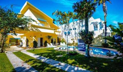 Casa com 4 dormitórios à venda, 347 m² por R$ 2.200.000,00 - Acapulco - Guarujá/SP