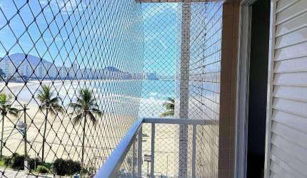 Apartamento à venda na Praia das Astúrias, Guarujá - SP.