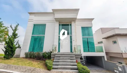 Casa mobiliada com 04 suítes, espaço gourmet e 04 vagas!