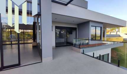Casa á venda condomínio Portal da Serra com 04 suítes, escritório, toda automatizada ,vista para o vale, acabamento impecável.