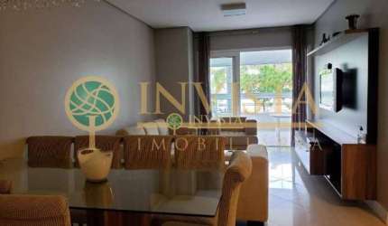 À venda na Praia de Jurerê Internacional! Sacada com churrasqueira, 151m², semi mobiliado, 3 suítes e 2 vagas de garagem.
