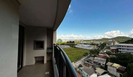 À venda | 74 m², sacada com churrasqueira, 2 quartos e 1 vaga de garagem - Saco Grande, em Florianópolis.