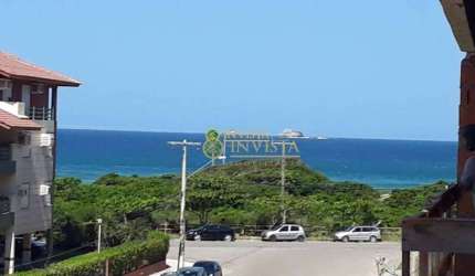 Apartamento com 130m², Vista Mar, sacada com churrasqueira, 3 quartos e 2 vagas de garagem.
