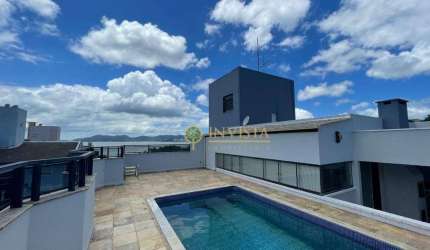 Andar alto, 3 quartos, terraço privativo com piscina e vista Mar no Estreito - À venda em Florianópolis
