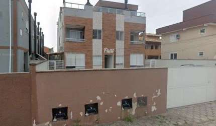 À venda na Praia do Campeche! 2 quartos, 63m², churrasqueira e 1 vaga de garagem.