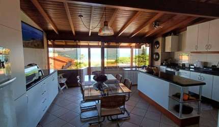 À venda | 99 m², Vista Mar, Churrasqueira, 3 quartos e 2 vagas de garagem - Praia de Canajurê, em Florianópolis.
