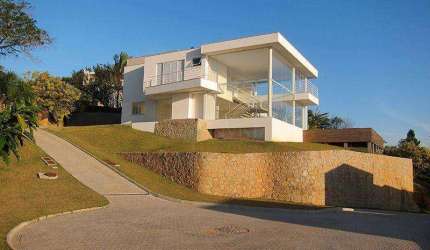 À venda | Condomínio fechado, 461 m², vista livre para o Mar e Pôr do Sol, 5 vagas de garagem - Cacupé, em Florianópolis.