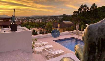 Casa com 6 dormitórios, 980 m² - venda ou aluguel - Colinas da Anhangüera - Santana de Parnaíba/SP