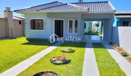 Casa nova à venda em Arroio do Sal,  na Praia de São Jorge, com 3 dormitórios.