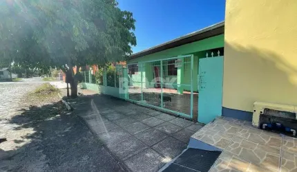 Terreno com 2 Casas com 5 quartos no total a venda em Torres RS