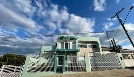 Casa com 4 suítes no bairro Centenário em Torres RS