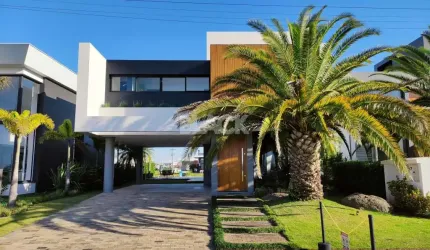 Casa mobiliada 4 suítes no Reserva das Águas Torres RS