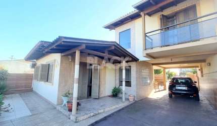 Lote com 3 casas em Torres RS