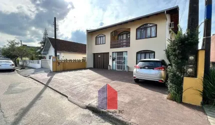 Sobrado Comercial com 2 casas no Bairro Iririú