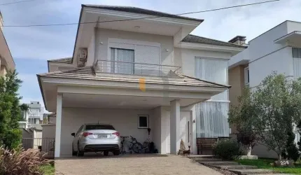Casa com 4 dormitórios para alugar, 265 m² - Alphaville - Gravataí/RS