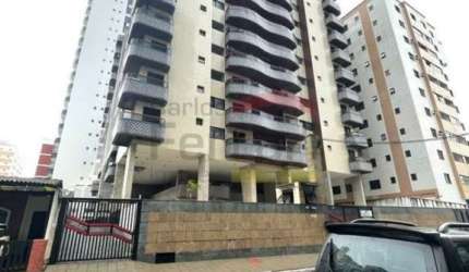 APARTAMENTO NA VILA TUPI A 350 METROS DA PRAIA COM 2 DORMITÓRIOS, SENDO1 SUÍTE, 2 VARANDAS E 1 VAGA