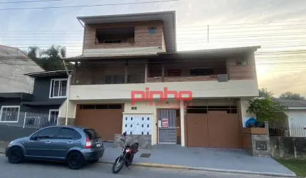 Apartamento com 1 dormitório para alugar, 50 m² por R$ 1.344,80/mês - Forquilhas - São José/SC