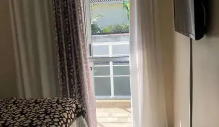 Casa em condomínio fechado com 2 quartos à venda na Rua Joaquim Aurélio Nabuco de Araújo, Cidade Jardim, Caraguatatuba, 101 m2 por R$ 426.000