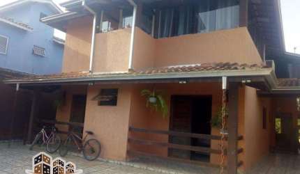 Casa com 6 quartos à venda no Massaguaçu, Caraguatatuba  por R$ 800.000