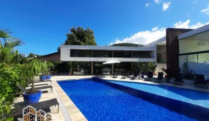 Casa em condomínio fechado com 5 quartos à venda no Camburi, São Sebastião  por R$ 2.890.000