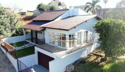 Casa com 3 dormitórios à venda, 328 m² por R$ 1.230.000,00 - Jardim das Acácias - São Leopoldo/RS