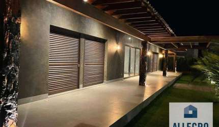 Exclusivo Rancho à Venda no Condomínio Enseada 2 com 4 suítes e   com Espaço para vários veículos / Próximo a Br 153 !!