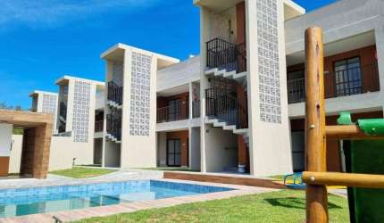 Village com 3 dormitórios à venda, 70 m² por R$ 700.000,00 - Itacimirim - Camaçari/BA