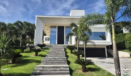 Sobrado moderno à venda no Aldeia do Vale com 4 suítes, lazer completo e vista definitiva