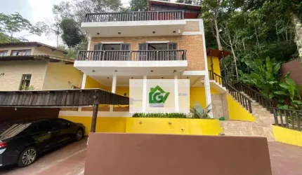 Casa com 3 dormitórios à venda, 121 m² por R$ 900.000,00 - Martim de Sá - Caraguatatuba/SP