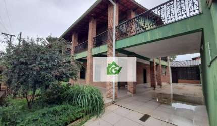 Casa com 3 dormitórios à venda, 248 m² por R$ 1.250.000,00 - Indaiá - Caraguatatuba/SP