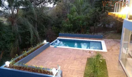 Casa com 3 dormitórios à venda, 354 m² por R$ 2.297.000,00 - Condomínio Chácara Flora - Valinhos/SP