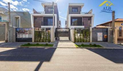 Sobrado com 4 dormitórios à venda, 122 m² por R$ 790.000 - Uberaba - Curitiba/PR