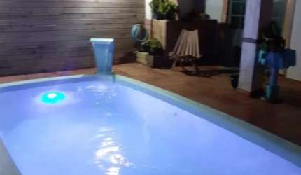 BELA CASA COM PISCINA  NA BARRA DE TRAMANDAÍ