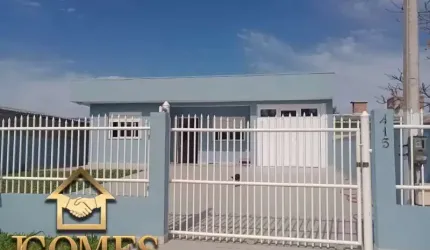 Casa nova em laje de concreto a poucas quadras do mar