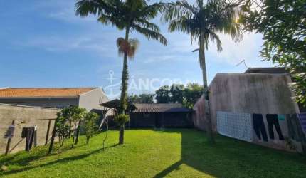 Casa com amplo espaço de terreno em frente, no centro de Itapema do Norte, próximo ao asfalto em Itapoá/SC