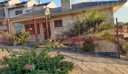 Casa com 3 quartos à venda na Rua Joaquim Andreazza, 24, Cidade Nova, Caxias do Sul, 317 m2 por R$ 870.000