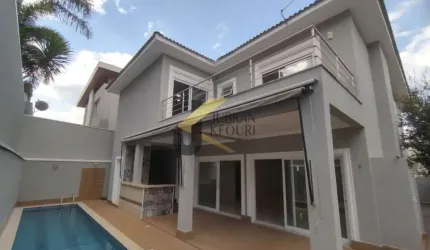 Casa em condomínio para alugar no Parque dos Resedás - Campinas, com 04 suítes ( 1 máster) living 03 ambientes , piscina e churrasqueira, 6  garagem