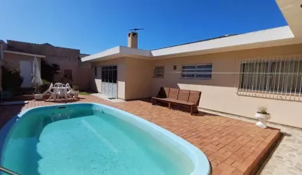 Casa com 5 dorms e 3 suítes no bairro Capoeiras